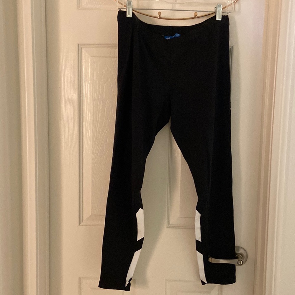 Adidas Originals Size Large Leggings with white stripes on back of calf